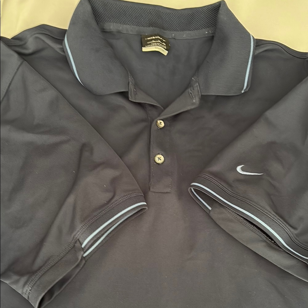 Nike Golf Dri-Fit Navy Blue Polo with light blue stripes on sleeves and Collar